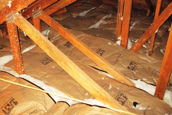 This is NOT what your insulation should look like. Paper facing should always face toward the inside of the home.